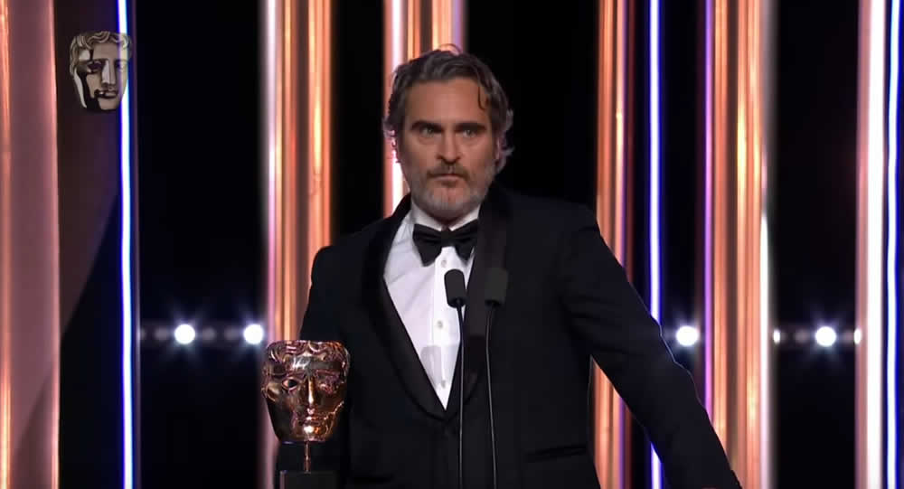 image of Joaquin Phoenix giving acceptance speech at 2020 BAFTAs