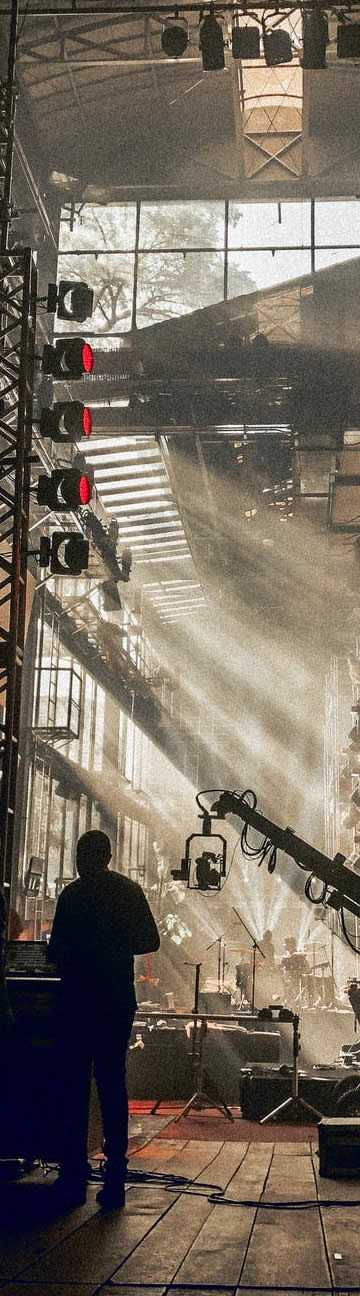 man standing on a fog laden film set
